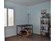 Functional office space with desk, bookshelves, and natural light at 2819 Canyon Crest Dr, Highlands Ranch, CO 80126