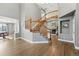 Open foyer with hardwood floors and view of living room and staircase at 16123 Quarry Hill Dr, Parker, CO 80134