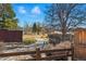 Neighborhood path with split rail fence and mature trees, ideal for walking and recreation at 16123 Quarry Hill Dr, Parker, CO 80134