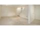 Spacious finished basement with carpet flooring and neutral paint ready for your personal touch at 8300 S Upham Way, Littleton, CO 80128