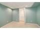 This bedroom features neutral carpeting, a closet, and soothing color scheme, creating a relaxing retreat at 8300 S Upham Way, Littleton, CO 80128