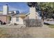 Townhouse exterior with a quaint entrance and well-kept lawn at 8300 S Upham Way, Littleton, CO 80128