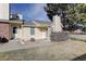 Inviting townhouse exterior with a neatly landscaped front yard and cozy entrance at 8300 S Upham Way, Littleton, CO 80128