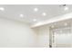 Finished basement area featuring recessed lighting and white walls at 7899 S Country Club Pkwy, Aurora, CO 80016