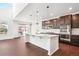Modern kitchen featuring a large island, stainless steel appliances, and sleek cabinetry at 7899 S Country Club Pkwy, Aurora, CO 80016