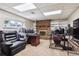 Finished basement featuring a brick fireplace and an area setup for gaming at 848 S 13Th Ave, Brighton, CO 80601