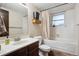 Bathroom with single sink vanity, medicine cabinet and tub with shower at 848 S 13Th Ave, Brighton, CO 80601