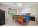 Comfortable bedroom with a private balcony and plush carpeting at 848 S 13Th Ave, Brighton, CO 80601