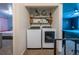 Convenient laundry area with newer washer and dryer units at 4673 S Lowell Blvd, Denver, CO 80236