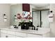 Elegant bathroom boasts a double vanity, sleek fixtures, and a large mirror, creating a spa-like retreat at 9186 Telluride Ct, Commerce City, CO 80022
