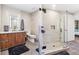 Modern bathroom featuring a glass-enclosed shower, wood vanity, and stylish fixtures at 1901 Wazee St # 504, Denver, CO 80202
