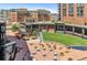 Community gathering space with outdoor seating, dining areas, and landscaping at 1901 Wazee St # 504, Denver, CO 80202