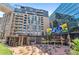 Urban plaza with outdoor dining areas and views of contemporary architecture at 1901 Wazee St # 504, Denver, CO 80202