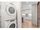 Convenient in-unit laundry area with stacked washer and dryer, adjacent to the kitchen at 1901 Wazee St # 504, Denver, CO 80202