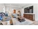 Open living space with modern furnishings, a stylish rug, and a view into the adjoining kitchen at 1901 Wazee St # 504, Denver, CO 80202