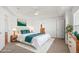 Serene main bedroom featuring a king bed, plush rug, and ample natural light at 51 W 6Th Pl, Byers, CO 80103