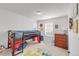 bedroom with a bunk bed and colorful rug at 14063 Jackson St, Thornton, CO 80602