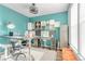 Bright home office with built-in shelving and workspace at 14063 Jackson St, Thornton, CO 80602