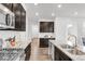 Kitchen with stainless steel appliances and ample cabinetry at 14063 Jackson St, Thornton, CO 80602