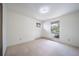 Well-lit bedroom with a window providing natural light, ideal for creating a cozy space with personalized decor at 13955 W 26Th Ave, Golden, CO 80401