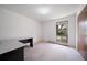 Bright bedroom with a built-in closet and a window overlooking the outdoors, offering a serene living space at 13955 W 26Th Ave, Golden, CO 80401