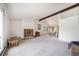 Spacious living area with a fireplace and lots of natural light at 13955 W 26Th Ave, Golden, CO 80401