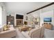 Open-concept living room featuring stylish furnishings and modern finishes at 13955 W 26Th Ave, Golden, CO 80401