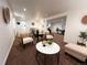 Finished basement space with neutral tones, recessed lighting, and comfortable seating areas at 9220 Lowell Blvd, Westminster, CO 80031