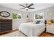 Calming bedroom with great light, a ceiling fan, and hardwood floors at 9220 Lowell Blvd, Westminster, CO 80031
