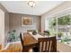 Cozy dining room featuring a large window and plants at 9220 Lowell Blvd, Westminster, CO 80031