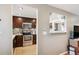 Kitchen featuring stainless steel appliances, granite counters, and tile backsplash at 9220 Lowell Blvd, Westminster, CO 80031
