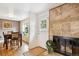 Entryway leading to dining area with fireplace and hearth at 9220 Lowell Blvd, Westminster, CO 80031