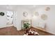 Bright living room showcasing modern furniture and decorative wall accents at 9220 Lowell Blvd, Westminster, CO 80031