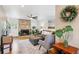 Cozy living room with hardwood floors, stone fireplace, and stylish furniture at 9220 Lowell Blvd, Westminster, CO 80031
