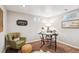 Bright office space with a comfortable chair, desk, and decorative elements at 9220 Lowell Blvd, Westminster, CO 80031