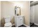 Bathroom with white single vanity and dark stone flooring and step-in shower at 19644 E Girard Dr, Aurora, CO 80013