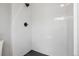 Clean shower stall featuring white subway tile and matte black shower head and fixtures at 19644 E Girard Dr, Aurora, CO 80013