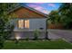 Charming single-story house featuring manicured lawn and stylish design elements at 710 Raleigh St, Denver, CO 80204