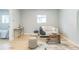 Bright living room featuring hardwood floors, neutral tones, and modern furniture at 710 Raleigh St, Denver, CO 80204
