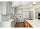 Elegant kitchen with custom cabinets, marble countertops, and stainless steel appliances at 4031 S Hudson Way, Cherry Hills Village, CO 80113