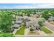 This charming home features a spacious lot with trees, a driveway, and solar panels in a friendly neighborhood at 12651 Elm St, Thornton, CO 80241
