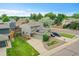 Lovely two-story home features a well-manicured lawn, solar panels, and a driveway with parking at 12651 Elm St, Thornton, CO 80241