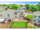 Aerial image showing the large yard, patio, and charming second story porch of this lovely home at 12651 Elm St, Thornton, CO 80241