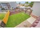 Aerial view of backyard, featuring lush grass and wood fence at 12651 Elm St, Thornton, CO 80241