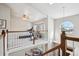 Open loft space perfect as a gym, featuring ample natural light and staircase views at 4175 S Andes St, Aurora, CO 80013