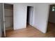 Bedroom with hardwood floors offers a closet and bright window at 1346 S Logan St, Denver, CO 80210