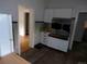 Retro kitchen design features white cabinets and vintage appliances at 1346 S Logan St, Denver, CO 80210