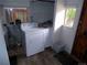 Laundry room equipped with a modern washer and dryer unit at 1346 S Logan St, Denver, CO 80210