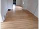 Living room featuring light hardwood flooring and neutral-toned walls at 1346 S Logan St, Denver, CO 80210