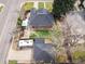 Aerial view showcasing the home's layout, RV parking, and manicured lawn, offering a glimpse of suburban charm at 795 N Jersey St, Denver, CO 80220